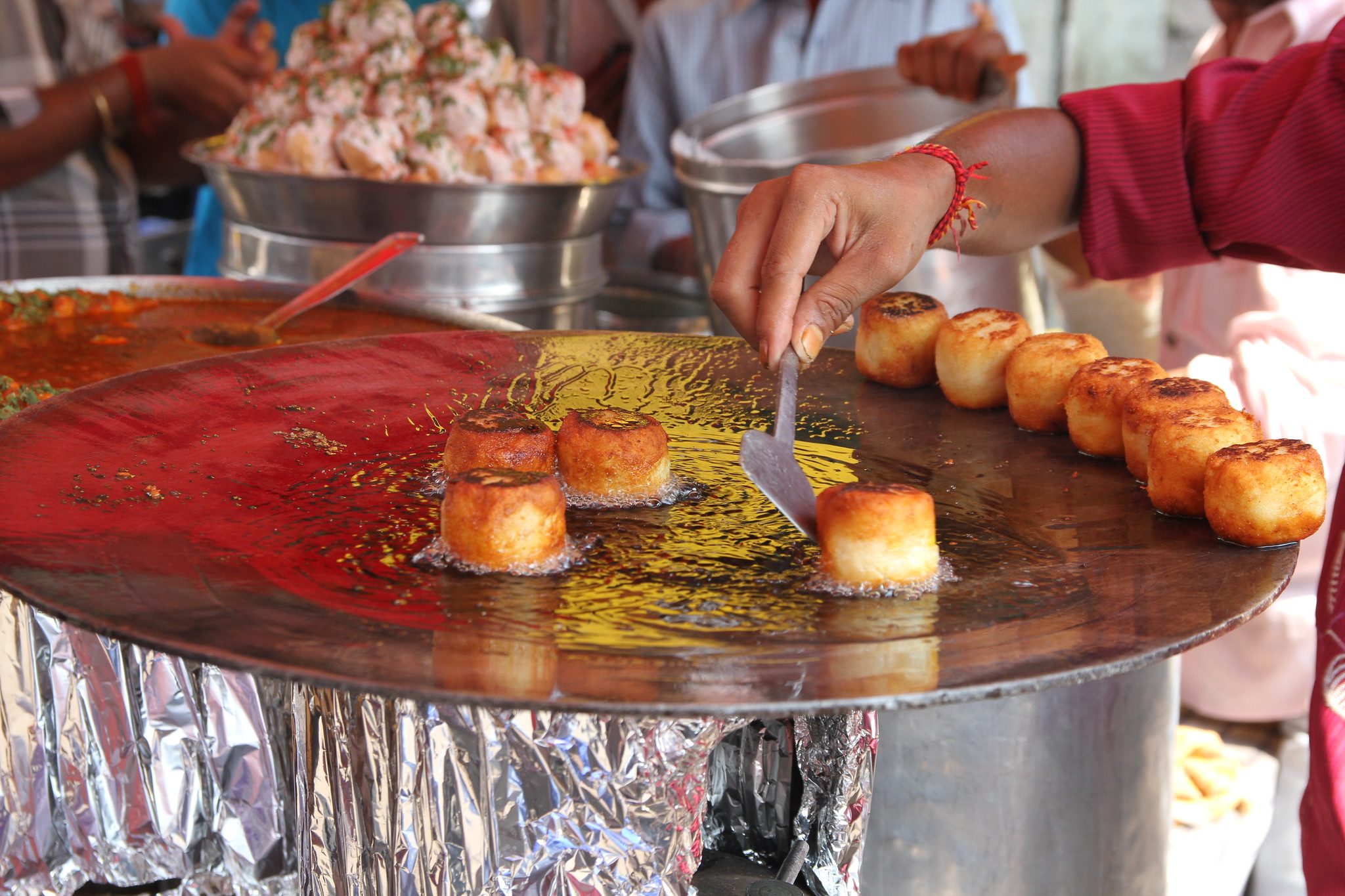 Aloo-tikkis being fried, Image Source: Flickr